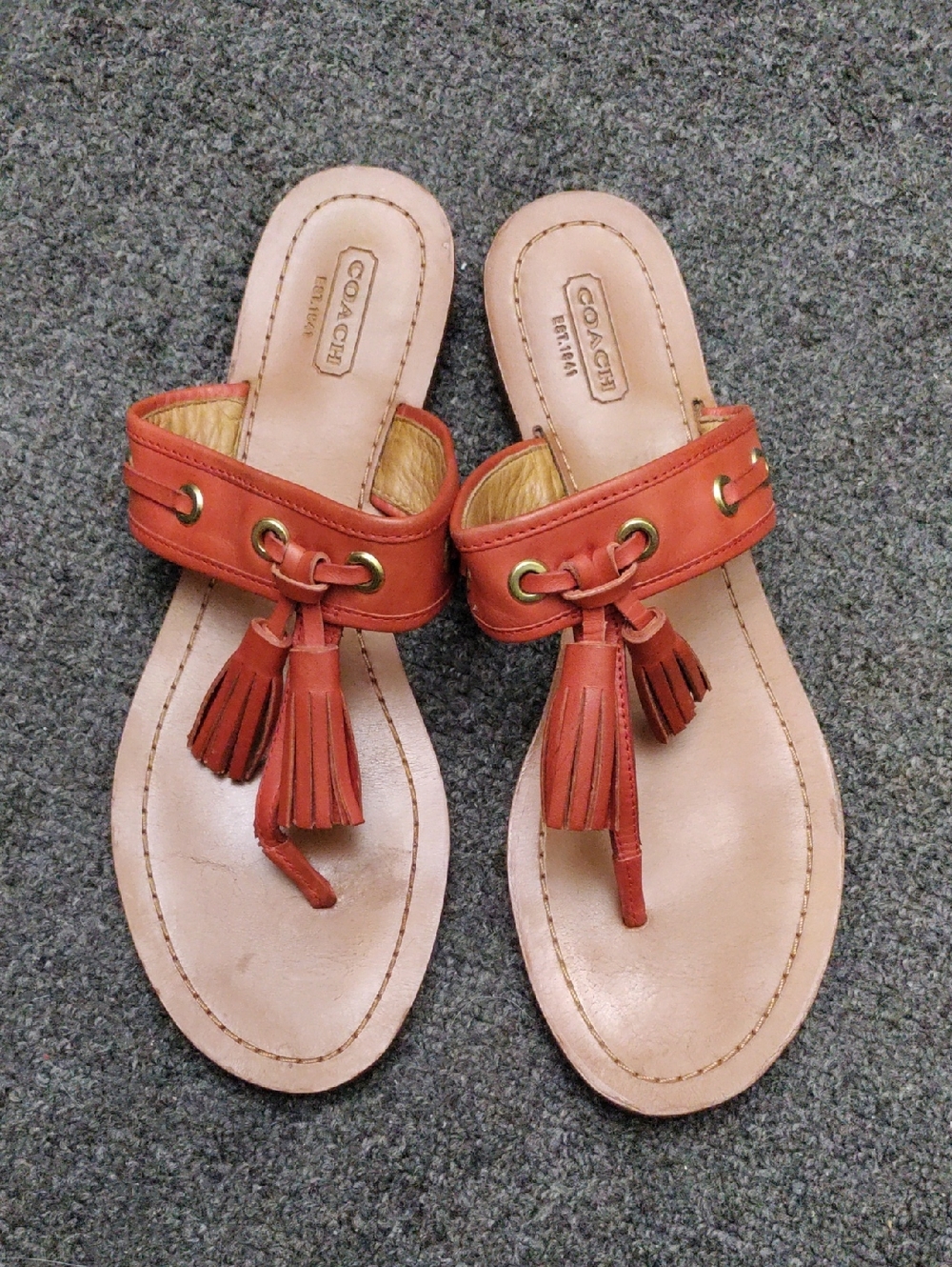 Coach Tassel Thong Sandals in Rust Orange Leather